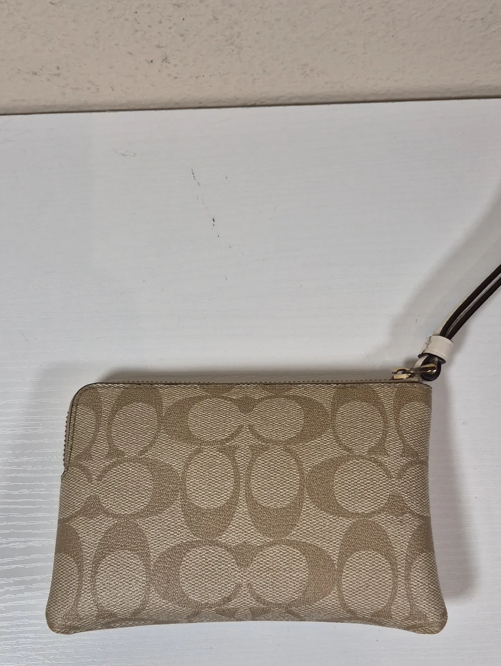 Coach Corner Zip Wristlet In Signature Canvas With Pear